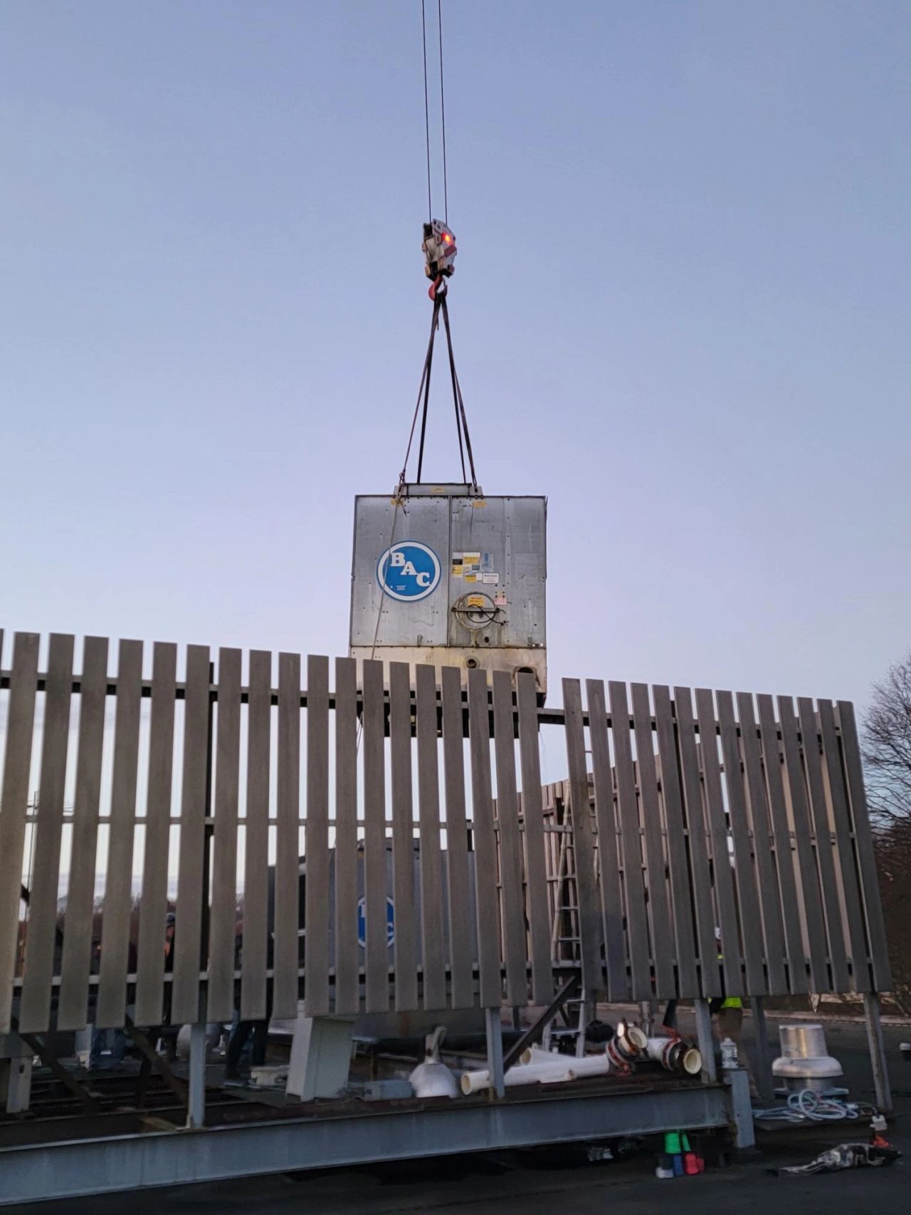 HVAC lowered by crane into place